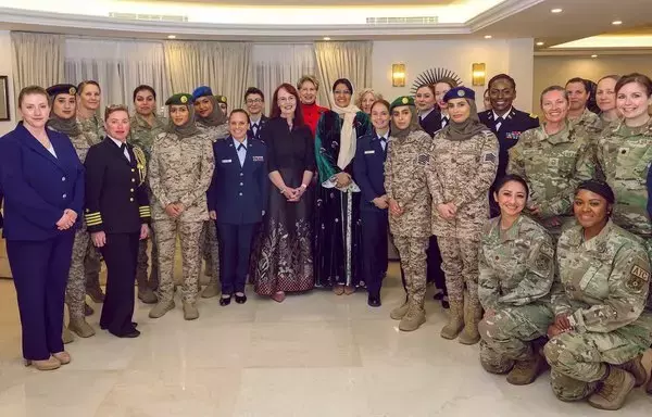 Alison Dilworth, the deputy chief of mission at the US Embassy in Riyadh, and Saudi Princess Reema bint Bandar pose for a photo with a number of Saudi woman leaders in the defense and security sectors in April 2021. [US Embassy in Saudi Arabia]