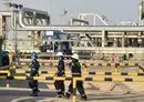 
Employees of Aramco oil company work in Saudi Arabia's Abqaiq oil processing plant. [Fayez Nureldine/AFP]        