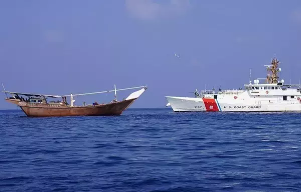 US Coast Guard cutter Clarence Sutphin Jr., at right, on January 28 seized advanced conventional weapons and other lethal aid originating in Iran and bound to Houthi-controlled Yemen from a vessel in the Arabian Sea. [CENTCOM]