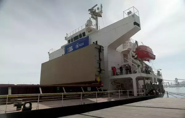 Bulk carrier Negmar Cicek is loaded with grain in the Black Sea port of Chornomorsk last March 24 to be sent to Yemen as part of the Grain From Ukraine program. [Sergii Mukaieliants/AFP]