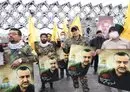 
Mourners attend the funeral of Razi Mousavi, a senior commander in the Quds Force of Iran's IRGC who was killed on December 25 in an air strike in Syria, in Tehran, on December 28, 2023. [Atta Kenare/AFP]        