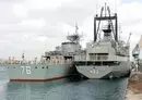 
Two Iranian warships dock in the Sudanese Red Sea city of Port Sudan on December 8, 2012. US officials have recently expressed concern over reports that Iran is shipping arms to the Sudan Armed Forces. [AFP]        