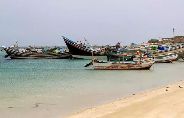 Fishing boats are moored near Yemen's Red Sea port of Ras Issa on June 12. [Mohammed Huwais/AFP]