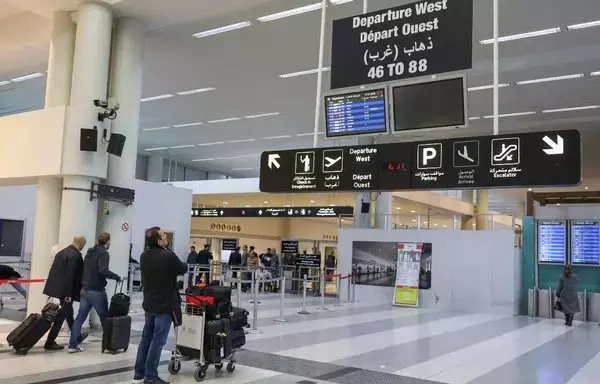 People are pictured inside the terminal at Beirut International Airport, on January 27, 2020. According to Information International, Lebanon saw a significant increase in the number of emigrants in 2023 compared to 2022. [Anwar Amro/AFP]