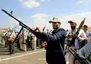 
Armed Yemenis display smuggled weapons during a parade in Sanaa on March 9. [Mohammed Huwais/AFP]        