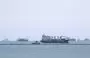 
Merchant ships transiting the Red Sea. [Ahmed Hasan/AFP]        