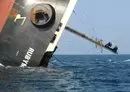 
This picture taken March 7 shows the Rubymar cargo ship partly submerged off the coast of Yemen. The bulk carrier went down off Yemen after a Houthi missile attack and poses grave environmental risks as thousands of tons of fertilizer threaten to spill into the Red Sea, officials and experts warn. [Khaled Ziad/AFP]        