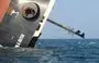 
This picture taken March 7 shows the Rubymar cargo ship partly submerged off the coast of Yemen. The bulk carrier went down off Yemen after a Houthi missile attack and poses grave environmental risks as thousands of tons of fertilizer threaten to spill into the Red Sea, officials and experts warn. [Khaled Ziad/AFP]        