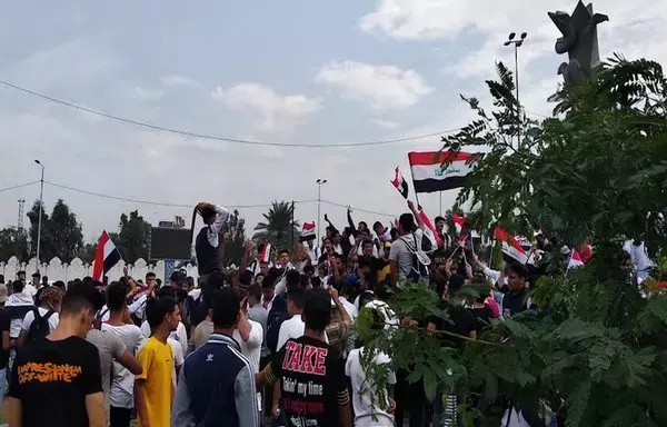 Iraqi youth demonstrate in Baghdad on October 27, 2019, against the corruption of Iran-backed militias. [Anas al-Bar/Al-Fassel]