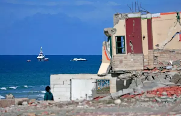 The Open Arms vessel that set sail from Larnaca in Cyprus carrying humanitarian aid is seen off the coast of Gaza City on March 15. [AFP]