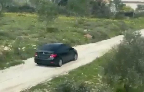 A screenshot from a video posted on X by the Lebanese Forces shows a Hizbullah vehicle leaving Rmeish at full speed after it was approached by townspeople.