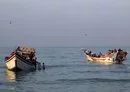 
Yemeni fishermen arrive to unload their catch from a boat in al-Khokha district on the southern edge of the Red Sea city of al-Hodeidah on January 16. [Khaled Ziad/AFP]        