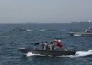 
Iranian military vessels are seen in the Strait of Hormuz on April 30, 2019. [Atta Kenare/AFP]        