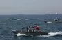 
Iranian military vessels are seen in the Strait of Hormuz on April 30, 2019. [Atta Kenare/AFP]        