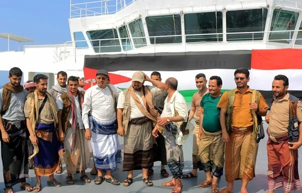 Houthi officials conduct a tour of the Galaxy Leader on November 22, 2023. The Iran-backed group seized the ship two days earlier in the Red Sea, taking its 25-member crew hostage. [AFP]