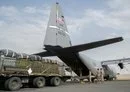 
US Central Command personnel load bundles of food aid onto a C-130 aircraft to drop into northern Gaza on April 9. [CENTCOM]        