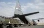 
US Central Command personnel load bundles of food aid onto a C-130 aircraft to drop into northern Gaza on April 9. [CENTCOM]        