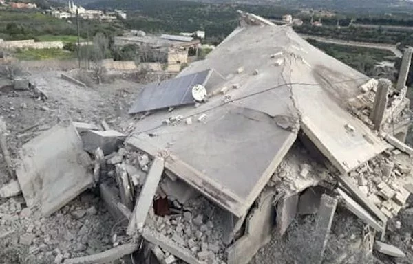 Houses in the southern town of al-Dhahira have been destroyed as Hizbullah steps up its attacks on Israel. The owners of this house and their four children survived the recent bombardment. [Al-Fassel]