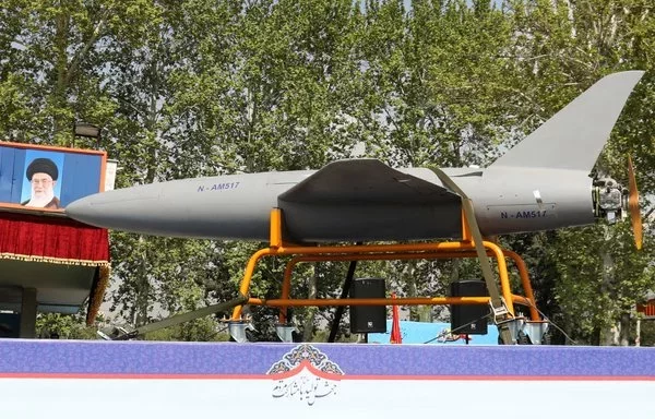 An Iranian military truck carries an Arash drone during a military parade as part of a ceremony marking the country's annual army day in Tehran on April 17. [Atta Kenare/AFP]