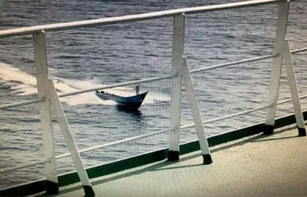 A photo shared by the Saudi government in March 2020 shows a remote controlled explosive boat approaching an oil tanker off Yemen's southern coast. [Saudi Press Agency]