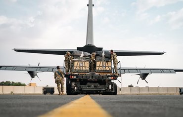 US airdrops continue to deliver relief as more aid enters Gaza by land