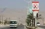 
A sign prohibiting civilians from bearing firearms hangs in the former Al-Qaeda in the Arabian Peninsula (AQAP) bastion of al-Mukalla in Yemen's southern Hadramaut province, on November 30, 2018. [Saleh al-Obeidi/AFP]        