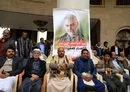 
Houthi supporters in Sanaa commemorate the second anniversary of the killing of IRGC Quds Force commander Qassem Soleimani (portrait) on January 3, 2022. [Mohammed Huwais/AFP]        