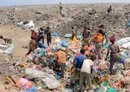 
Youths collect recyclable items at a garbage dump in Yemen's Red Sea port city of al-Hodeidah last August 15. [AFP]        