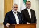 
Ismail Haniyeh, the Doha-based political bureau chief of Hamas, speaks to the press in Tehran on March 26 after a meeting with Iranian Foreign Minister Hossein Amir-Abdollahian. The foreign minister was killed in a May 19 helicopter crash in Iran. [AFP]        