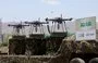 
Drones are displayed on the back of a vehicle during a military parade last September 21, marking the ninth anniversary of the Houthis' coup in Sanaa. [Mohammed Huwais/AFP]        