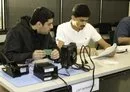 
Royal Saudi officers learn about circuit board technology during Electronic Warfare Officer training in 2023 at a US military base in Texas. [US Air Force]        