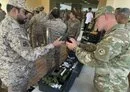 
US Army soldiers showcase equipment and capabilities to Saudi soldiers during the Eagle Resolve 23 military exercise in the kingdom. [CENTCOM]        