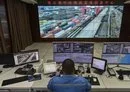 
A worker operates a crane from a remote station at the Lianyungang Port Container Terminal, Jiangsu province, China, on March 24, 2021. [Hector Retamal/AFP]        