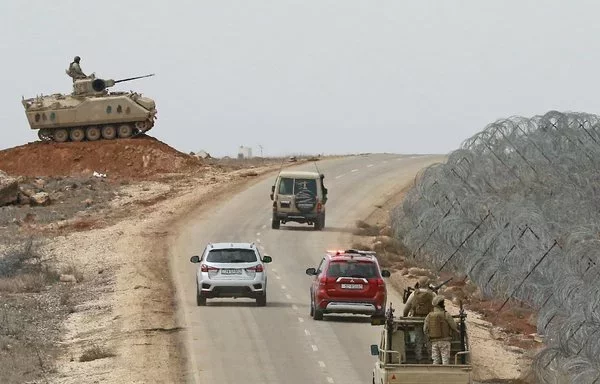 Jordanian soldiers patrol along the border with Syria to prevent drug trafficking on February 17, 2022. [Khalil Mazraawi/AFP]