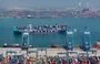 
A cargo ship on May 14 loaded with containers at a port in Qingdao, in China's Shandong province. [AFP]        