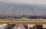 
A photo taken during a media tour organized by the Lebanese Ministry of Public Works and Transport shows a plane taking off from the cargo runway at Beirut's international airport on June 24. [Anwar Amro/AFP]        