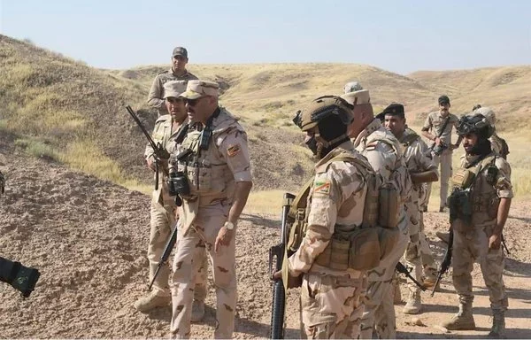 Iraqi soldiers search for ISIS remnants on June 9. [Iraqi Ministry of Defense]