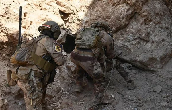 Iraqi soldiers storm an ISIS hideout in their country's north on June 22. [Iraqi Counter-Terrorism Service]