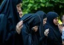 
Women in southern Beirut mourn during a funeral on July 31. [Khaled Desouki / AFP]        