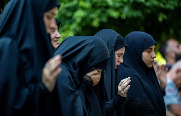 Women in southern Beirut mourn during a funeral on July 31. [Khaled Desouki / AFP]