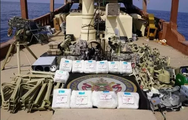 US forces display arms and lethal aid from Iran they seized from a vessel in the Arabian Sea, en route to the Houthis, on January 28. [CENTCOM]