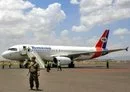 
A Yemenia Airways aircraft carrying Houthi prisoners exchanged in a deal with the Yemeni government sits on the tarmac at Sanaa International Airport on April 14, 2023. [Mohammed Huwais/AFP]        