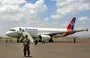 
A Yemenia Airways aircraft carrying Houthi prisoners exchanged in a deal with the Yemeni government sits on the tarmac at Sanaa International Airport on April 14, 2023. [Mohammed Huwais/AFP]        