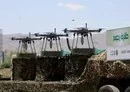 
Houthi drones are displayed on the back of a vehicle during an official military parade in Sanaa in September 2023. [Mohammed Huwais/AFP]        