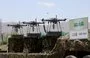 
Houthi drones are displayed on the back of a vehicle during an official military parade in Sanaa in September 2023. [Mohammed Huwais/AFP]        