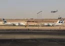 
A US Air Force C-130 Hercules military transport aircraft lands near EgyptAir planes on the tarmac at Cairo International Airport in Cairo on June 3. [Amir Makar/AFP]        