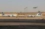 
A US Air Force C-130 Hercules military transport aircraft lands near EgyptAir planes on the tarmac at Cairo International Airport in Cairo on June 3. [Amir Makar/AFP]        