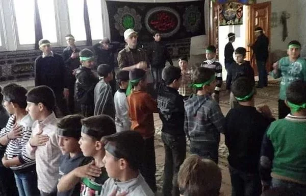 Deir Ezzor children attend an event organized by the Iranian Cultural Center in Deir Ezzor on June 26, 2021. [Nidaa al-Furat]