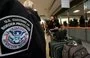 
An international air traveler presents her declarations to a US Customs and Border Protection Officer in this photo from December 21, 2011. [Paul J. Richards/AFP]        