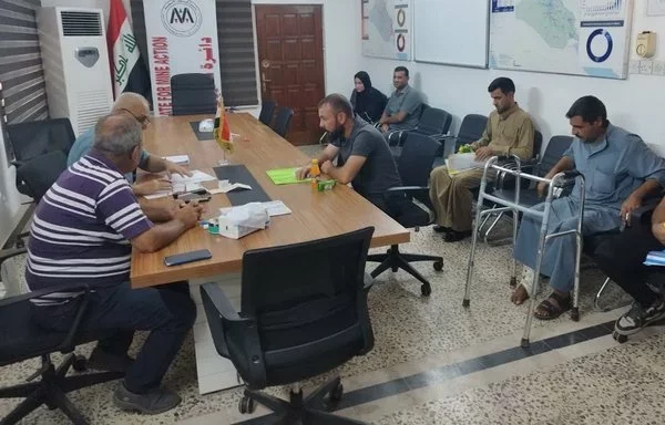 Victims of mine explosions register in Mosul on August 24 to receive health and social services from the Directorate for Mine Action. [Directorate for Mine Action]